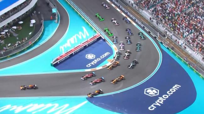 Oscar Piastri (top orange car) flew through around the outside. Photo: Fox Sports.