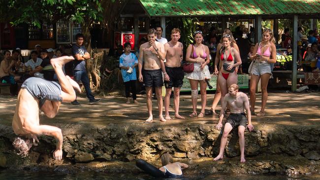 Tourists visit the Phukham Cave lagoon in Vang Vieng. Picture: AFP