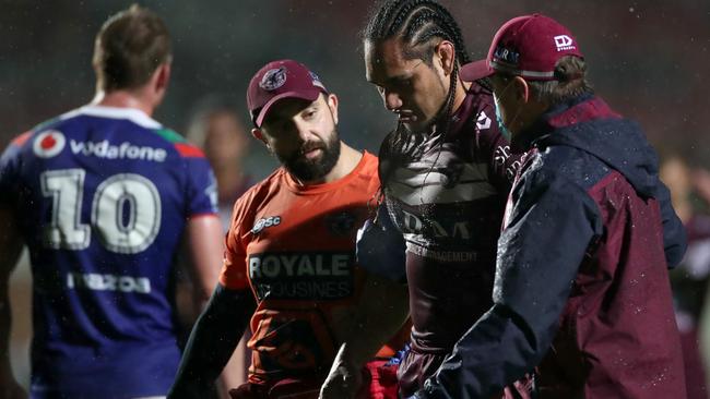 Martin Taupau is taken off after a heavy hit during the match with the New Zealand Warriors.