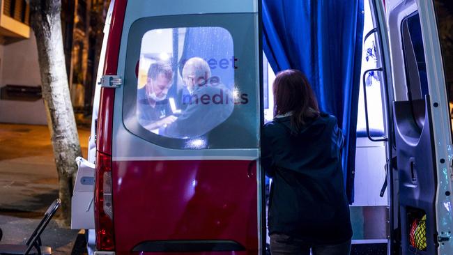 Volunteer Melanie Lindenberg chats to Dr Jeff Jankelson inside the roaming medical van. Picture: Darren Leigh Roberts