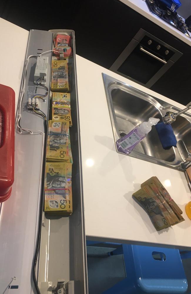 Drugs and cash seized during raid at Coomera