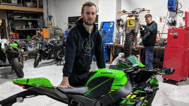 Josh Grainger, of Elanora Heights, with his damaged motorcycle.