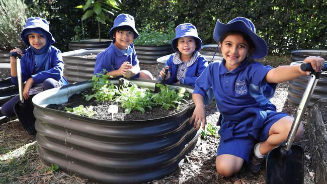 Students Hajera, Marc, Caitlyn and Yara from Belmore South Public School which held a casual clothes day to raise money for drought-ravaged farmers this month. Picture: Brett Costello