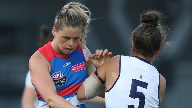 Bulldogs midfield star Katie Brennan gets some attention from Tayla Bresland. Picture: Wayne Ludbey