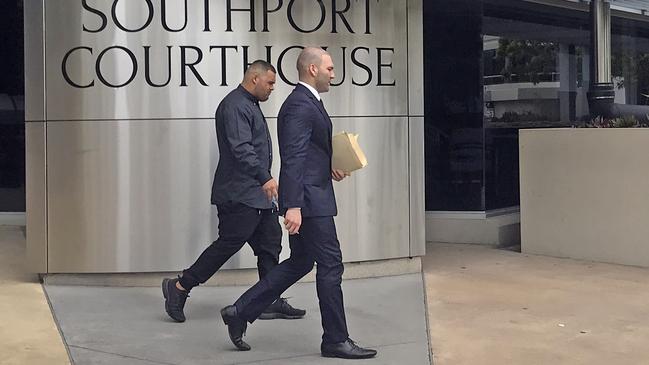 Ronny Soul Ross, 19, leaves Southport Magistrates Court with defence solicitor Farshad Sarabi of Hannay Lawyers. Picture: Jodie Callcott.