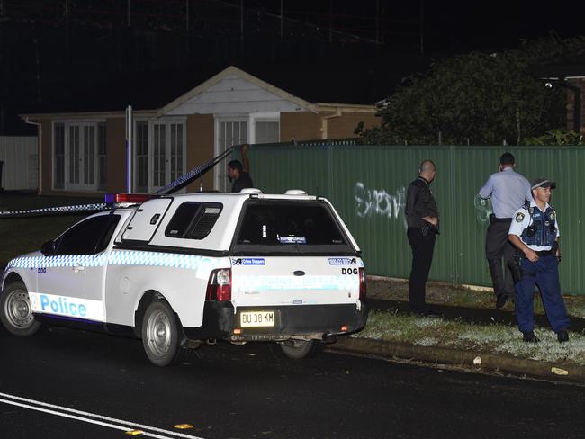 Officers cordon off the scene last night. Picture: Gordon McComiskie