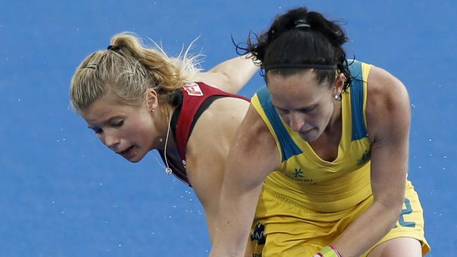 Great Britain's Sophie Bray and Australia's Madonna Blyth, right, in action during their match at the Champions Trophy.