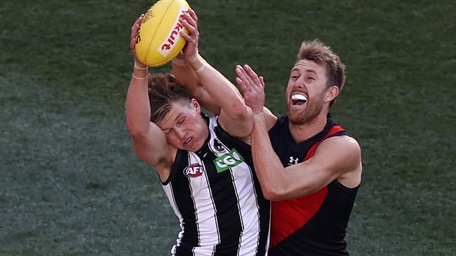 Rantall takes a tough mark against Essendon’s Dyson Heppell in last season’s Anzac Day clash. Picture: Michael Klein