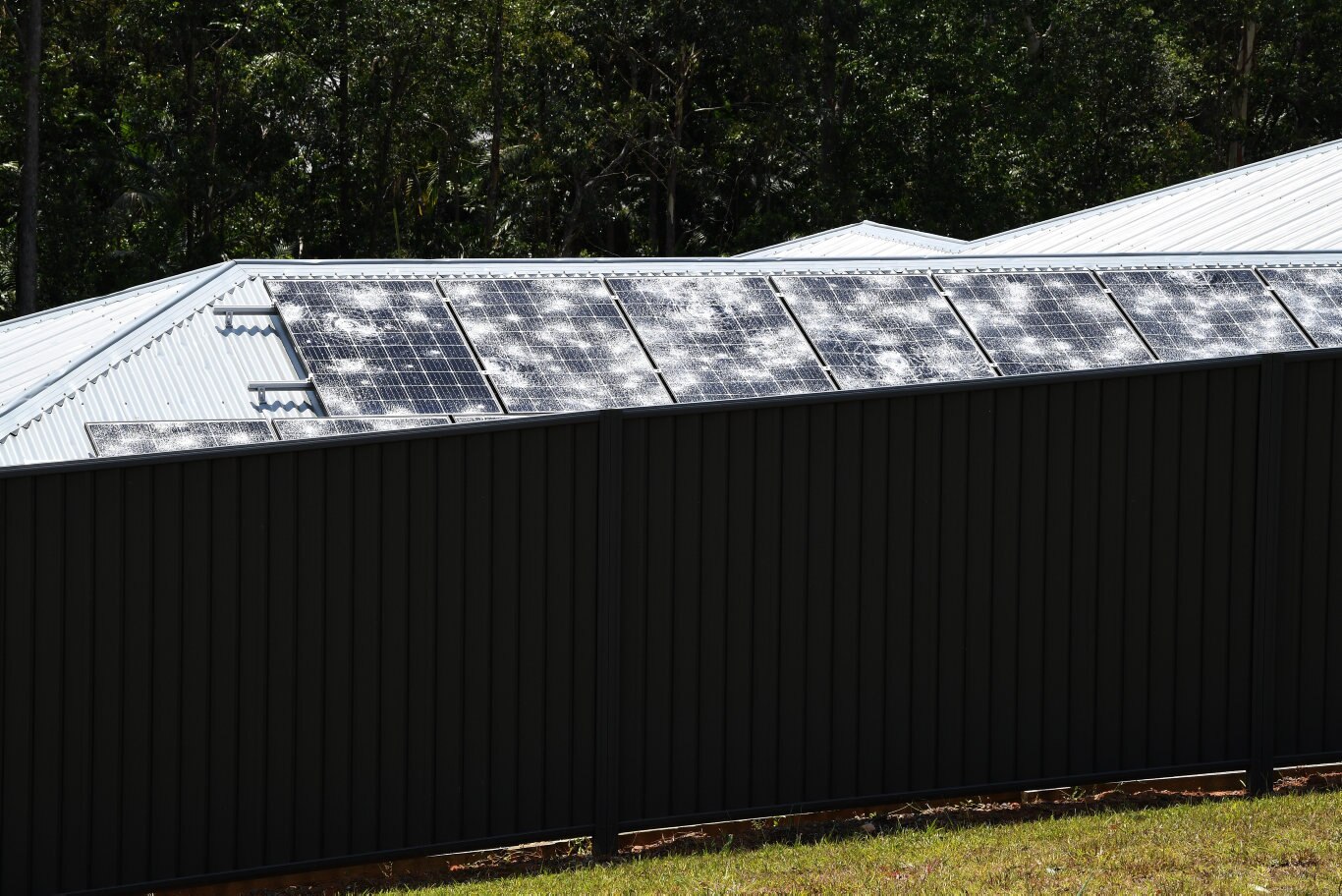 Cleaning up after the Sunday storm on the Sunshine Coast Coast. Hail damage in Palmview.