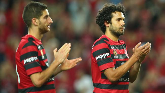 Labinot Haliti and Nikolai Topor-Stanley of the Wanderers look dejected as they thank the crowd. (Getty Images)