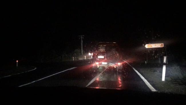 Adam O'Keefe's vehicle being towed to safety by Cradle Mountain Hotel staff.