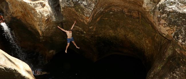 Dylan Pearse jumps in the pools. Picture by Scott Fletcher.