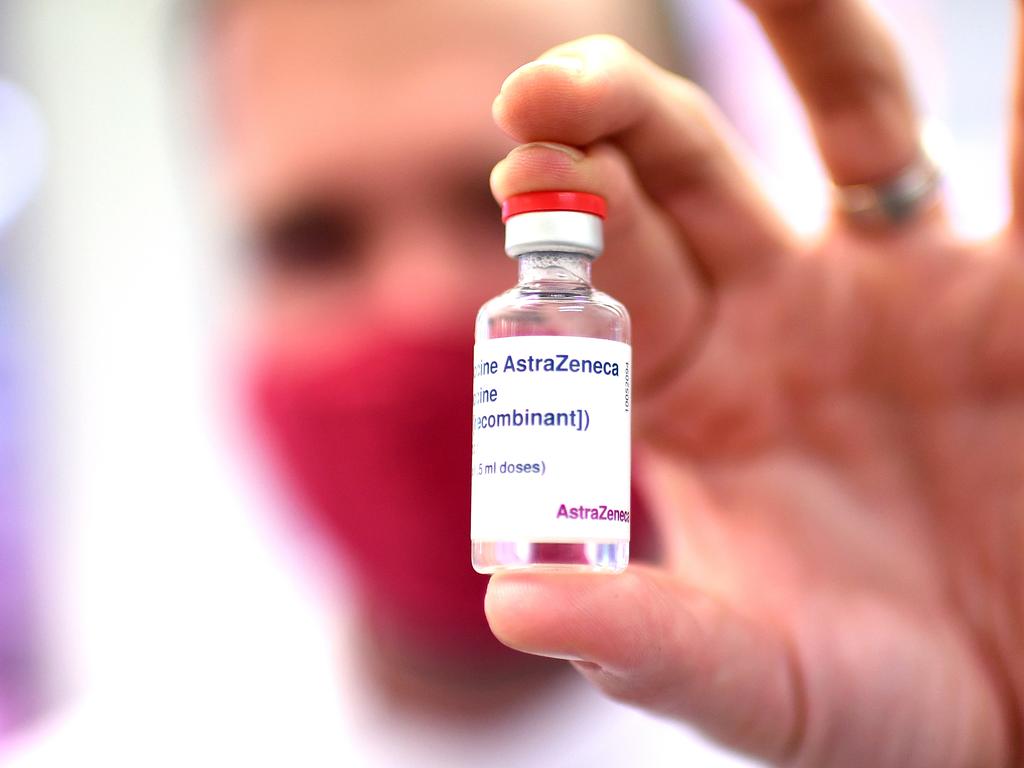 Pharmacist Michael Thorp holds a vial of the AstraZeneca Covid-19 vaccine at the Carina Day and Night pharmacy in Brisbane. Picture: Dan Peled / NCA NewsWire