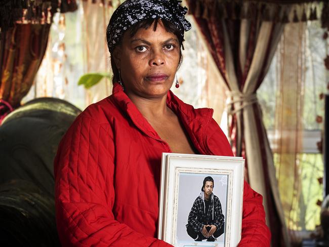 Hirut Weldmichael Seboka of Warrane holds a picture of her son Nazrawi Samson Woldmicheal who has been missing for nearly 4 years. Picture Chris Kidd