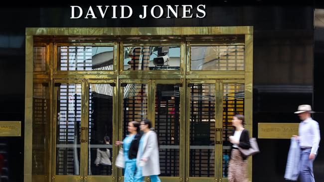 Shoppers pass the David Jones store in Sydney. Picture: Gaye Gerard