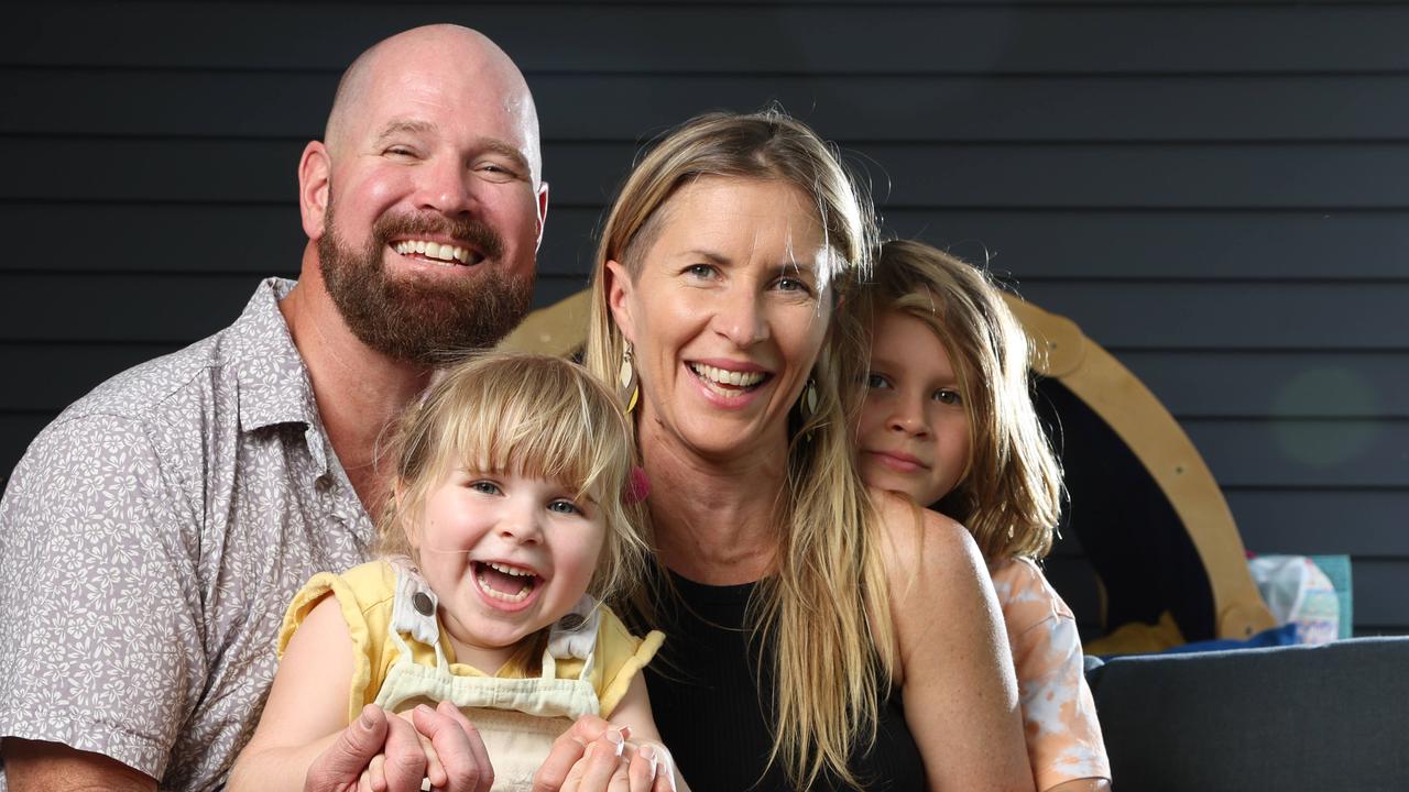 Chris and Golden Whitrod with kids Tallulah 5, and Finn 8, who are selling their house to help fund clinical trials to find a cure for their daughter's rare neurodegenerative disease. Picture: Lachie Millard