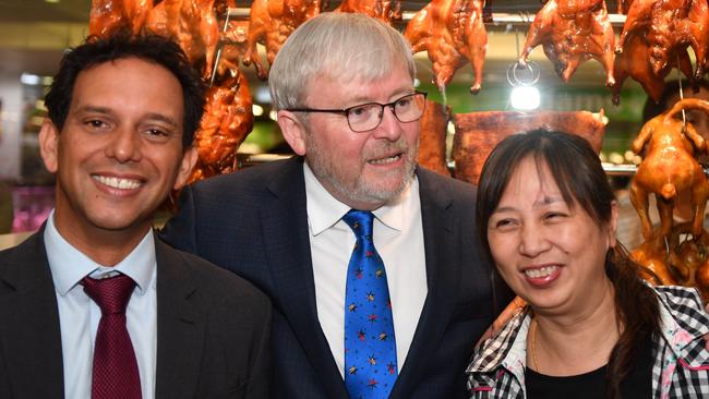 Kevin Rudd campaigns with Chris Gambian during a street walk in Hurstville, Sydney, yesterday. Picture:  AAP