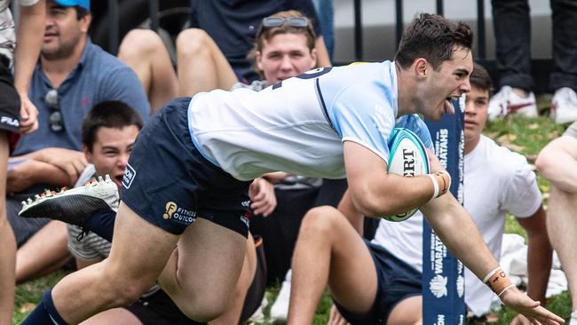 Zach Fittler scoring against the Rebels.