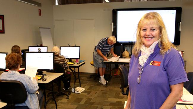 Computer Pals Blacktown president Wendie Lambert helps seniors learn their way around a computer.