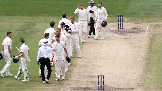 Australia and England shake hands after the Boxing Day Test.