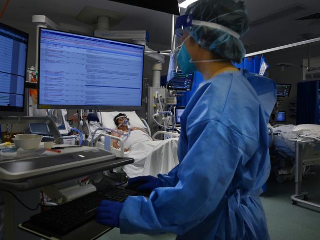 These photos have been supplied via David Faktor from St Vincent's Hospital as a POOL handout.   ICU staff care for a COVID-19 positive patient in St VincentÃ¢â¬â¢s HospitalÃ¢â¬â¢s ICU. Sydney, NSW. 13th July, 2021. Photo: Kate Geraghty