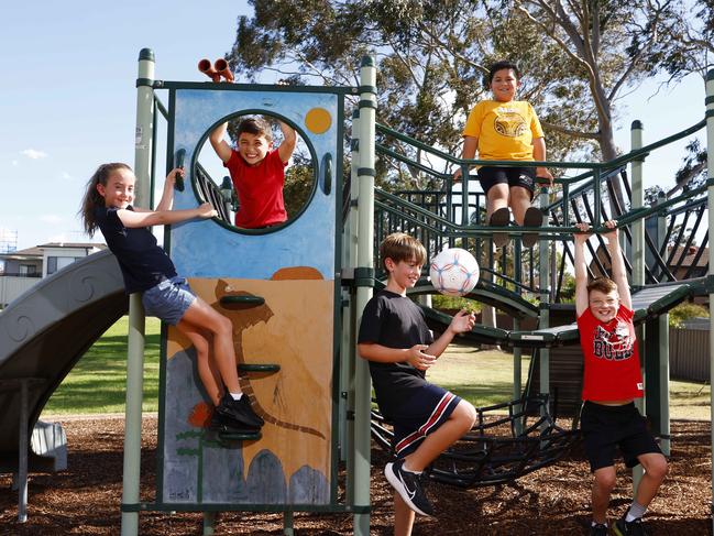 NSW NETWORK DECEMBER 14, 2023, PLEASE CONTACT PIC EDITOR KRISTI MILLER BEFORE PUBLISHING.Kids from left Mila Facey, 8, Jakob Saleh, 8, Isaac Facey, 10, Roman Leaupepe, 6, and Samuel Saleh,11, playing and being active at the Gregory St Reserve in Greystanes. Picture: Jonathan Ng