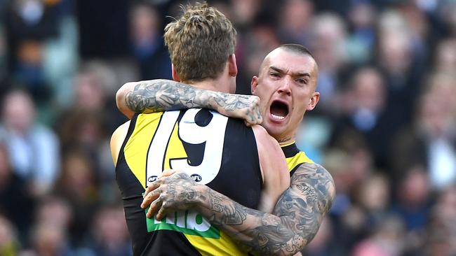 Tom Lynch gets a hug from Dustin Martin after kicking a goal. Picture: Getty Images