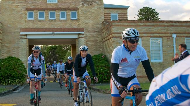 Mr Abbott crosses the Pollie Pedal line at North Head.