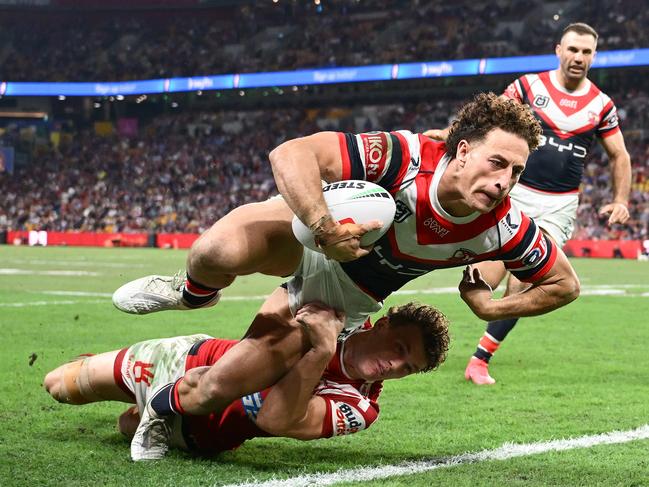 NRL live: Dolphins rattled as Roosters put on a magic show