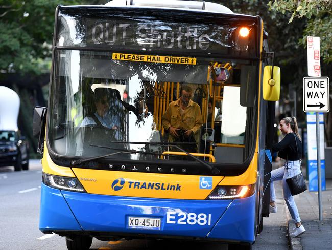 BRISBANE, AUSTRALIA - NCA NewsWire Photos AUGUST, 05, 2020.QUT university students board a bus in Brisbane. Students face losing their concession fares because Translink loophole doesn't grant cheaper fares to external students.Picture: NCA NewsWire/Dan Peled