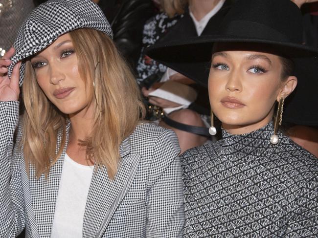 Fashion models Gigi Hadid, left, and Bella Hadid, right, attend the Tommy Hilfiger runway show during NYFW Spring/Summer 2020 at the Apollo Theater on Sunday, Sept. 8, 2019, in New York. (Photo by Andy Kropa/Invision/AP)