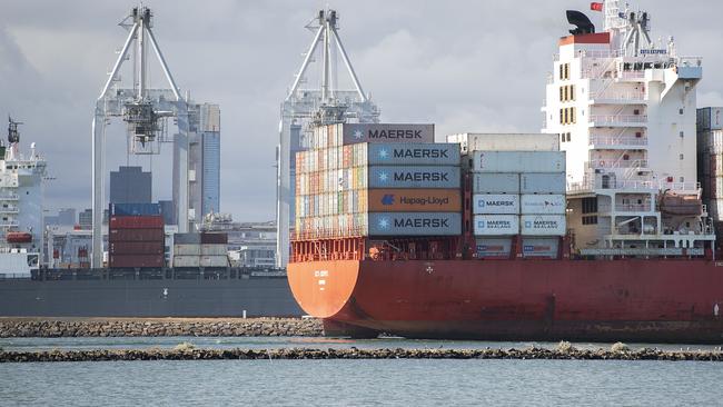 Container and shipping infrastructure is seen in Port Melbourne, where a number of Covid-19 cases have reduced labour availability in recent days. PICTURE: Ellen Smith