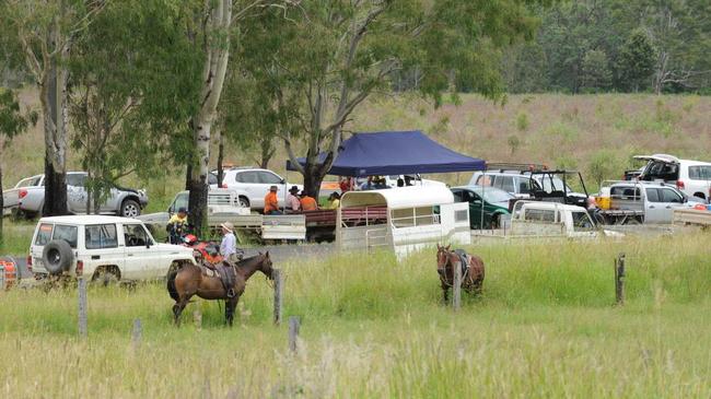 STILL SEARCHING: Police, SES and the local community man a forward command post near the scene of the missing motorcyclist's bike between Gin Gin and Mount Perry.Photo: Mike Knott / NewsMail. Picture: Mike Knott