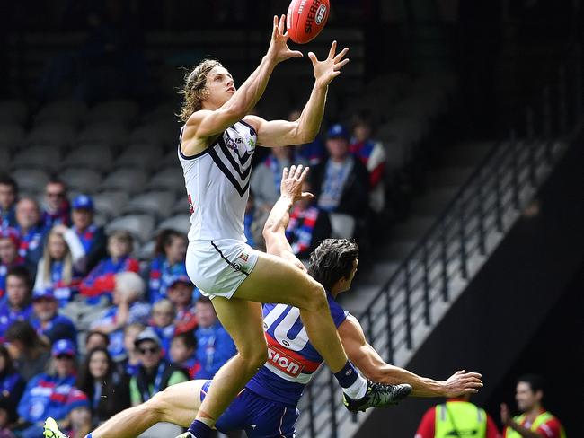 Nat Fyfe takes a mark over Easton Wood. Picture: George Salpigtidis