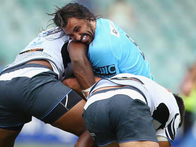 Jaques Potgieter is stopped by the Force defence.