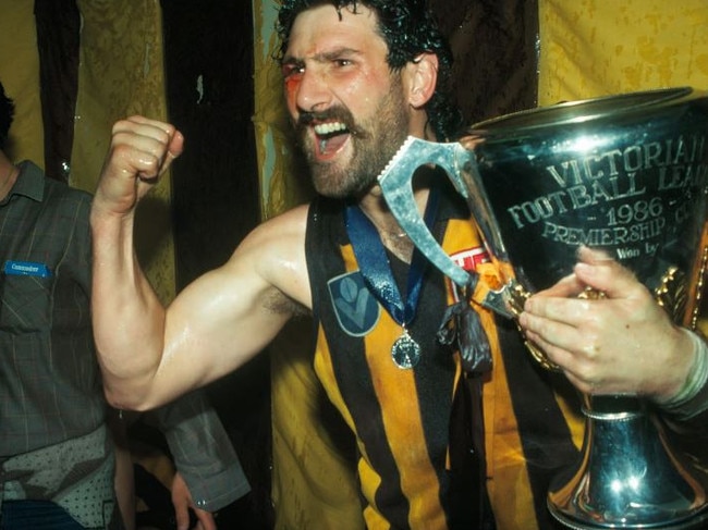 Blood and champagne showers the Ellis camera from Robert Dipierdomenico after the the 1986 Grand Final. Picture: Rennie Ellis, courtesy State Library Victoria.