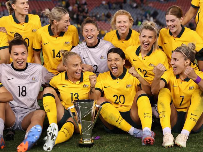 NEWCASTLE, AUSTRALIA - FEBRUARY 22: Sam Kerr of the Matildas signs celebrates with team mates after winning the Cup of Nations match between the Australia Matildas and Jamaica at McDonald Jones Stadium on February 22, 2023 in Newcastle, Australia. (Photo by Cameron Spencer/Getty Images)