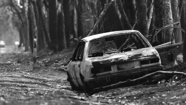 A burnt-out car at Timboon following the 1983 Ash Wednesday bushfires. Picture: News Limited