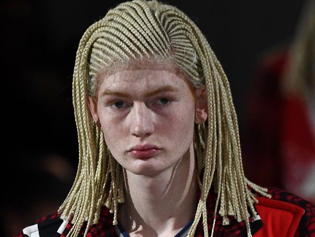 A model presents a creation by Comme Des Garçons, during the men's Fall/Winter 2020/2021 collection fashion show in Paris on January 17, 2020. (Photo by Anne-Christine POUJOULAT / AFP)