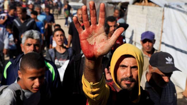 Israel kills at least 31 Palestinians waiting for food at US-backed Gaza aid sites
