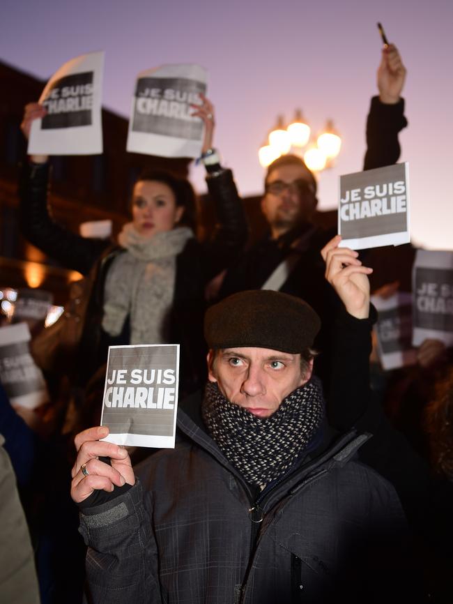 People holds placards reading ‘I am Charlie’ in a gathering in Toulouse. Picture: AFP/Eric Cabanis