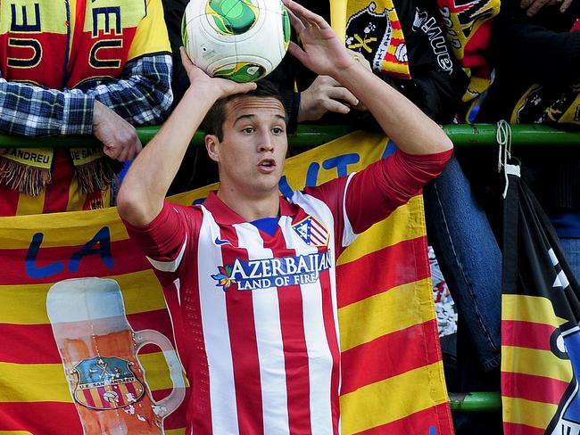 (Files) In this file picture taken on December 7, 2013, Atletico Madrid's defender Javier Manquillo Gaitan prepares to take a throw-in during the Spanish Copa del Rey (King's Cup) finals stage match against UE Sant Andreu at the Municipal Narcis Sala stadium in Barcelona. Liverpool have signed Spanish right-back Javier Manquillo on loan from reigning La Liga champions Atletico Madrid, the English Premier League club announced on Wednesday, August 6, 2014. Liverpool did not confirm the length of the loan, but 20-year-old Manquillo is reported to have committed to a two-year stay at Anfield. AFP PHOTO/ JOSEP LAGO