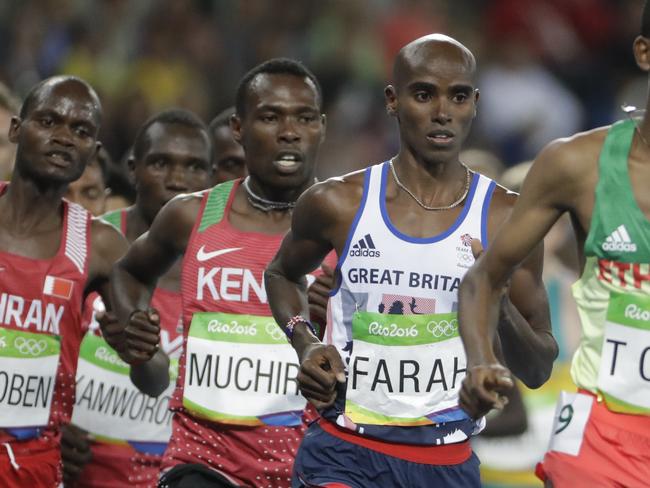 Britain's Mo Farah fell early on but recovered to win the men’s 10,000m race.