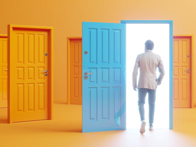 Business opportunity. Man choosing blue colored door between lots of doors and choices