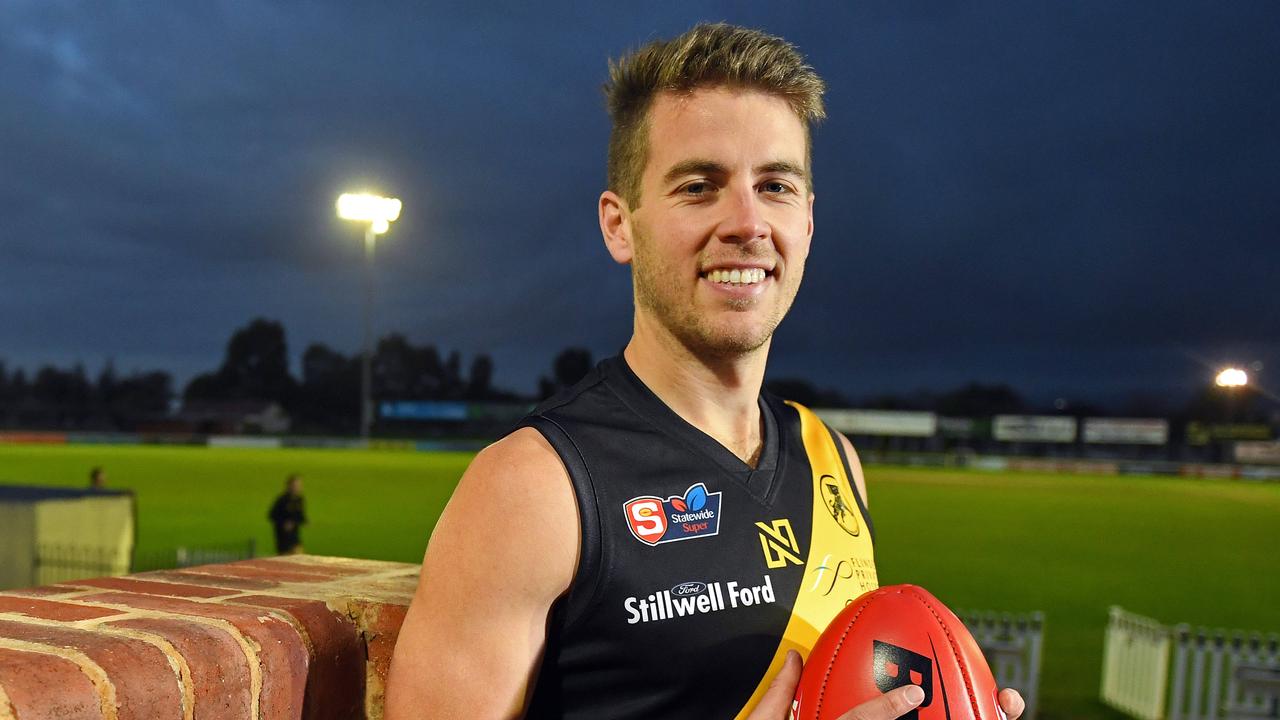 Glenelg captain Chris Curran signs at Prince Alfred Old Collegians ...