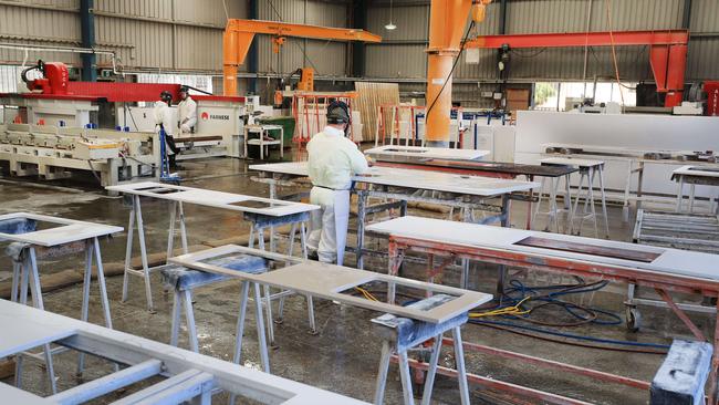 This Arundel stone benchtop fabrication business is fully compliant with the Code of Practice so its workers are protected from contracting silicosis. Photo: Scott Powick