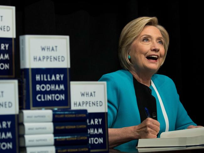Former US Secretary of State Hillary Clinton signs copies of her new book What Happened during a book signing event at Barnes and Noble bookstore in New York City. Picture: Getty