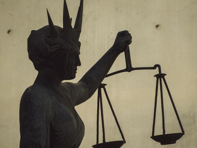 BRISBANE , AUSTRALIA - NewsWire Photos - BRISBANE , JUNE 24 2024: Generic photo of the scales of justice stature outside Brisbane Supreme Court in the Brisbane CBD. Picture: NewsWire / Glenn Campbell