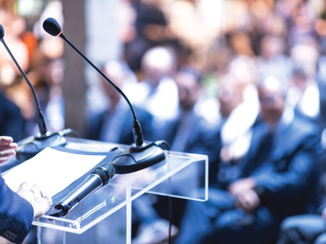 Public speaker at business conference, corporate presentation, workshop, coaching training, news conference, company meeting, public or political event