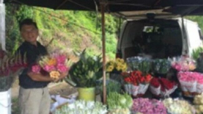 A photo of Mr Meduri and his flower van.